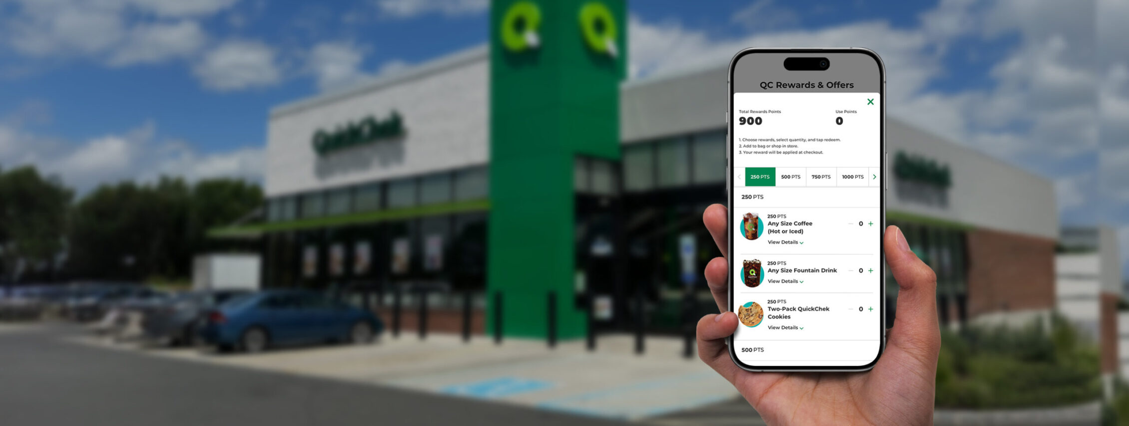 QC Rewards App on iPhone in front of QuickChek store